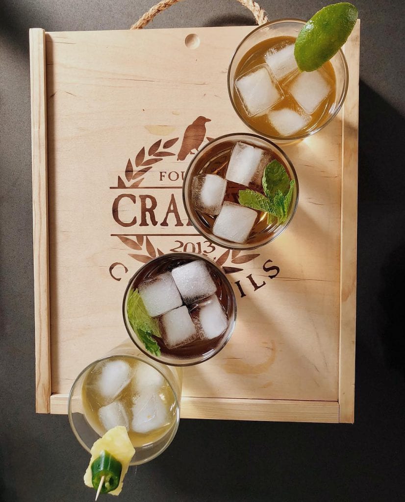 crafted cocktail Custom Branded Wood Box for Spirits & alcohol with cocktails arranged on top of wooden box